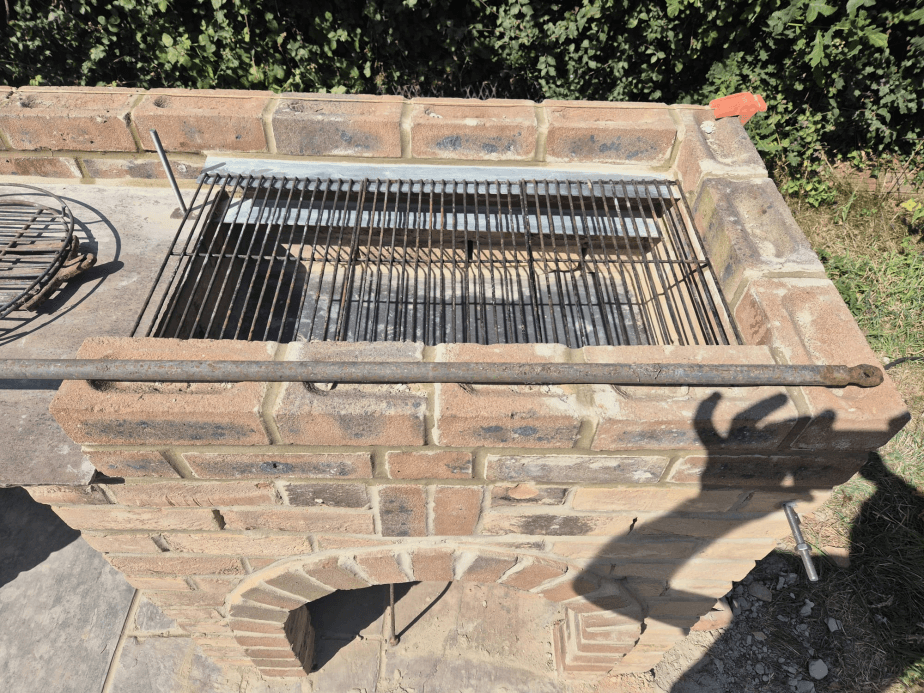 Bespoke brick BBQ with built-in grill