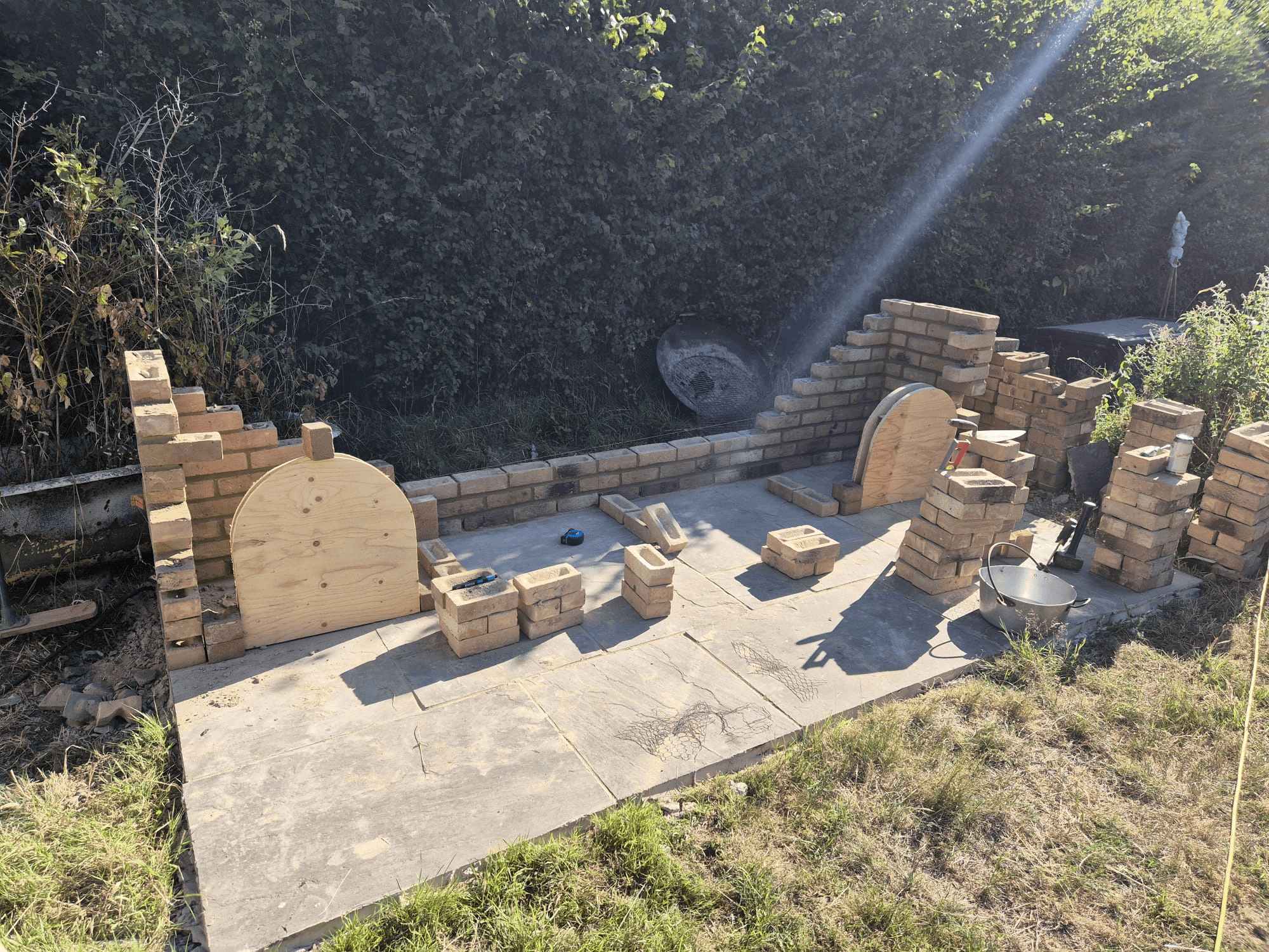 Outdoor BBQ entertainment area under construction