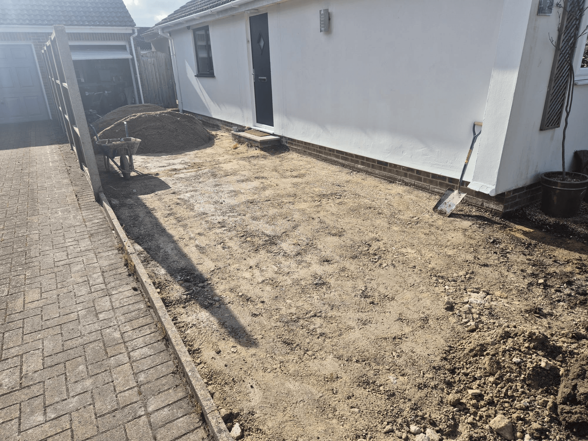Driveway excavation complete — area prepared and ready for block paving