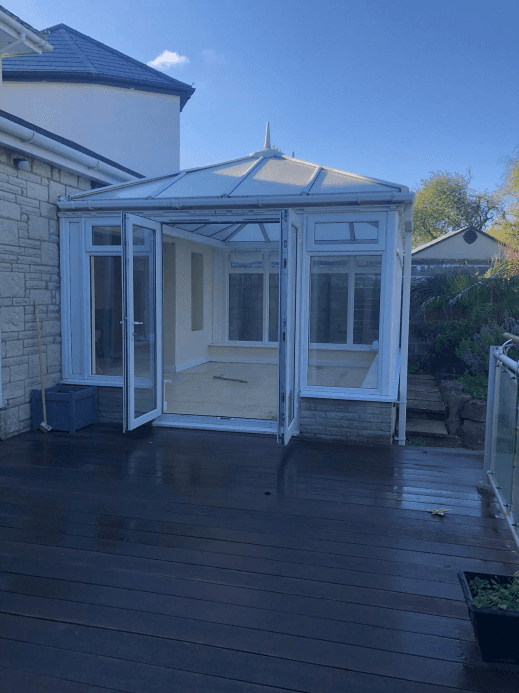 Completed conservatory extension with bi-fold doors