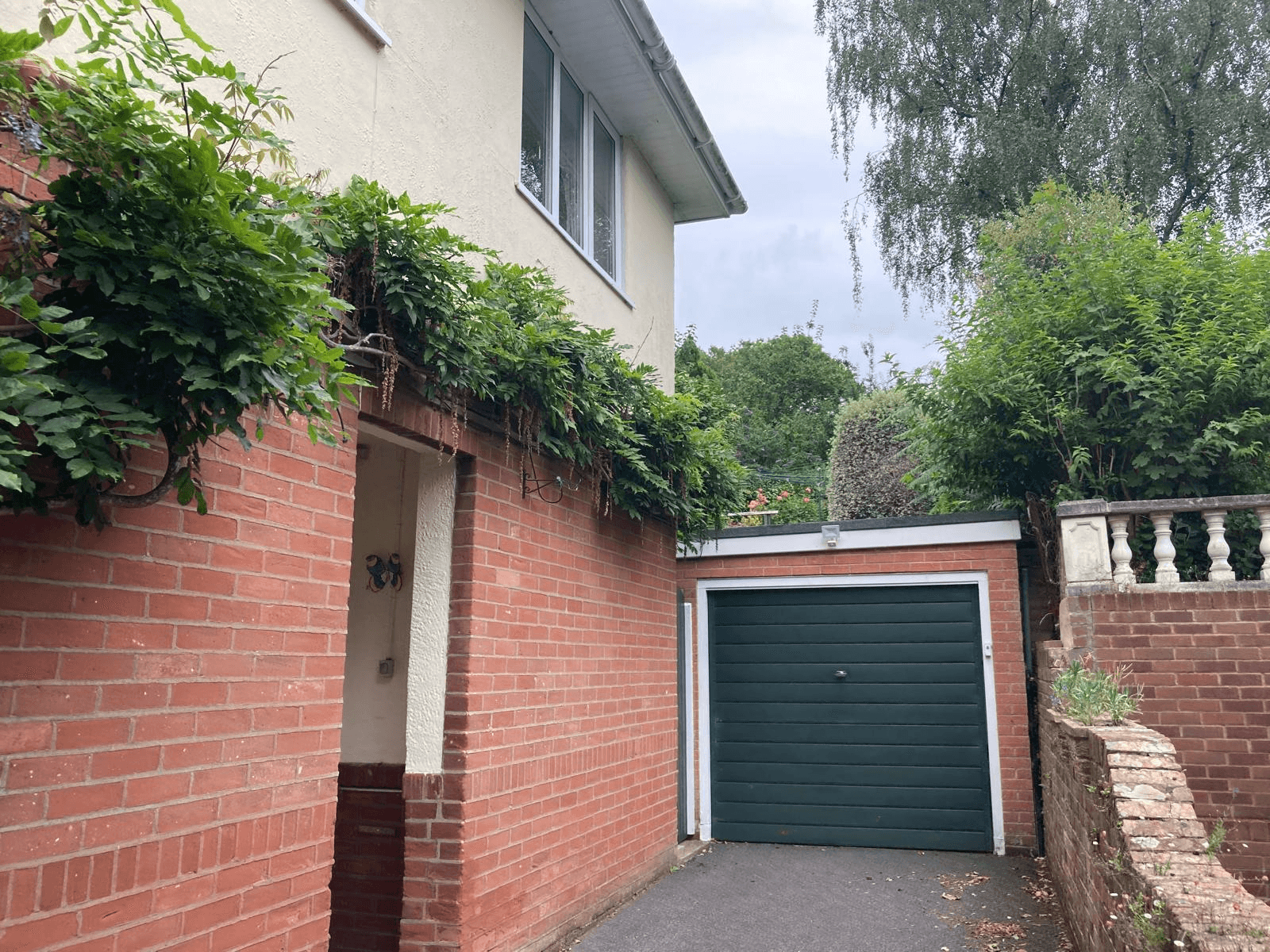 Property before wrap-around extension — detached house with garage